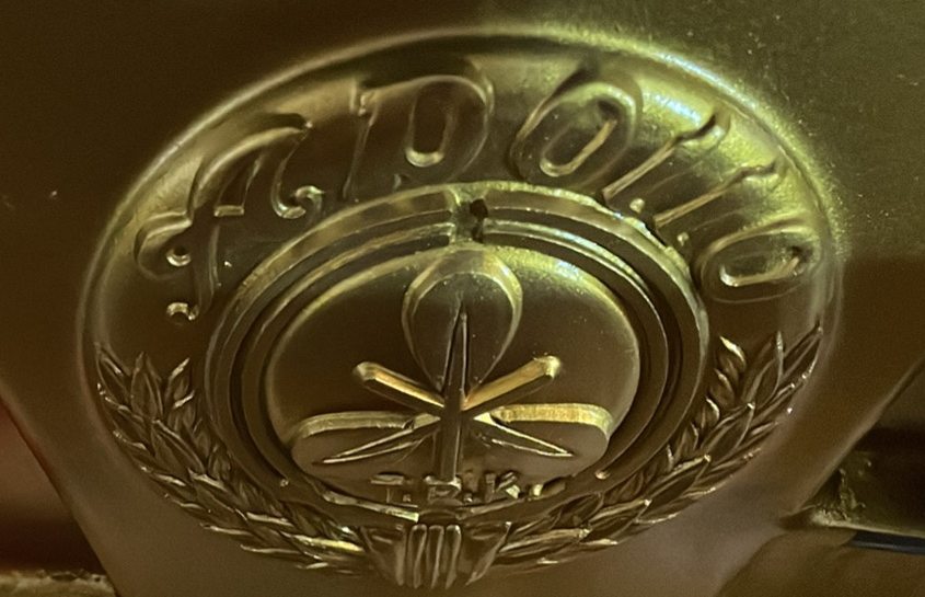 Apollo medallion cast into the plate