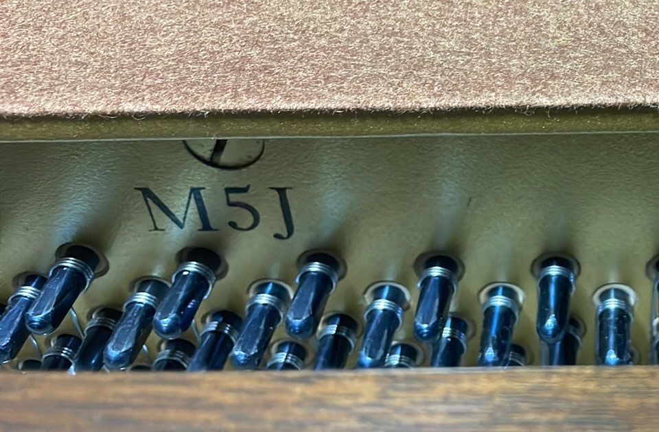 Plate stamped with the M5J model designation